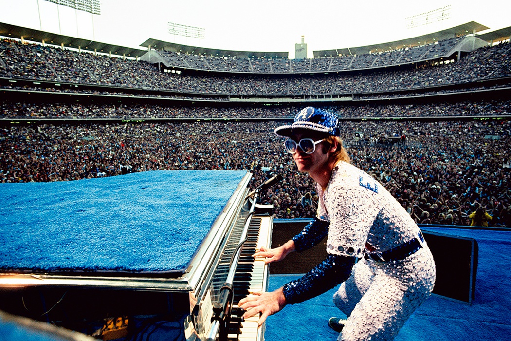 Elton John, Dodger Stadium, Los Angeles 1975 by Terry O'Neill (1938-2019) | Digital C-Type Print 61 x 50.8cm
