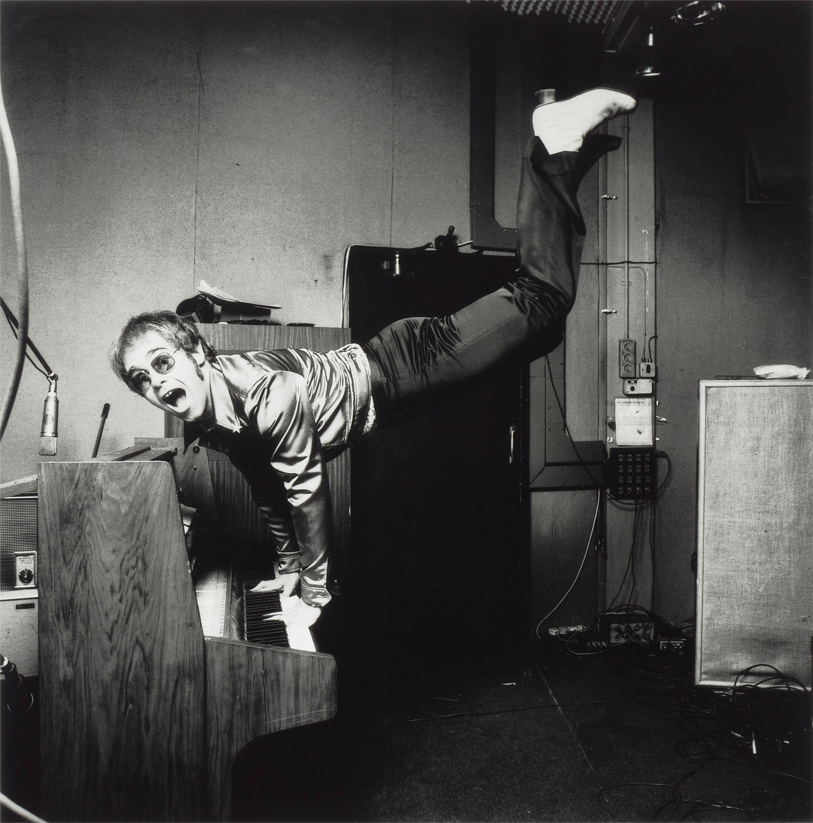 Terry O'Neill, Elton John Performing a Handstand, 1972
